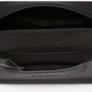 Closeup of 1 front zip pocket with 2 pouch pockets