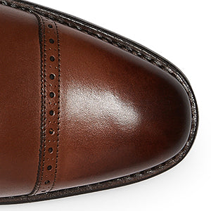 Closeup of Antiqued plain toe cap