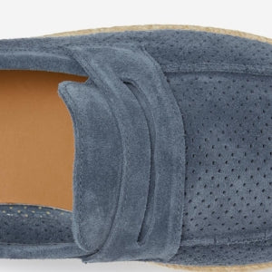 Closeup of Suede loafer saddle