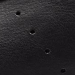 Closeup of Perforated quarter detail
