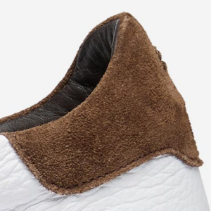Closeup of Contrast suede heel & tongue