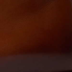 Closeup of Hand-antiqued calf leather upper